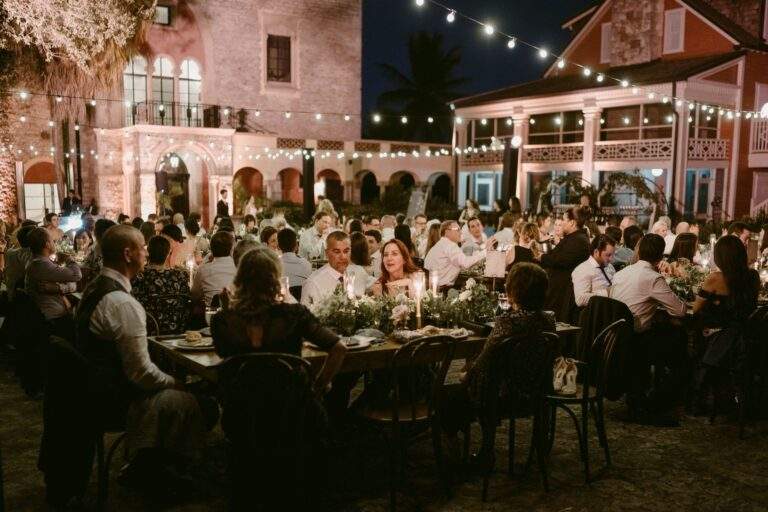 Loved ones gathered together seated at a wedding reception.
